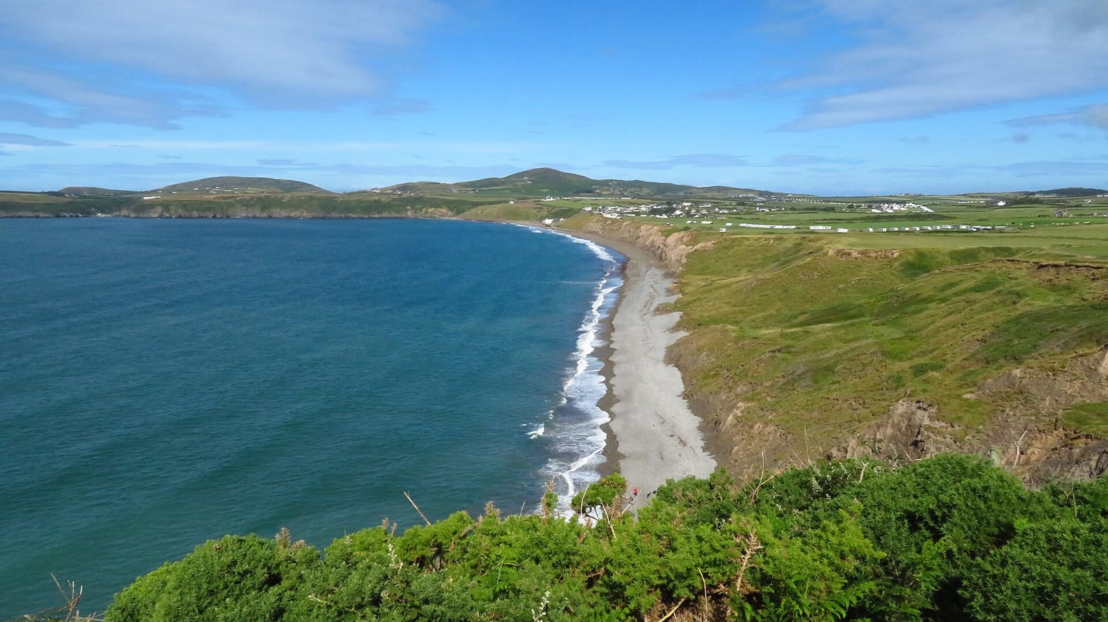 The coast path and bay at Aberdaron, near the tip of the Llyn