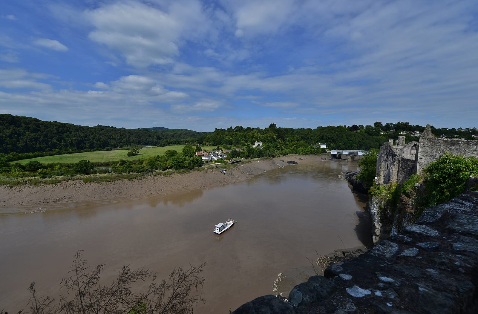 Chepstow Castle standing on cliffs above the River Wye