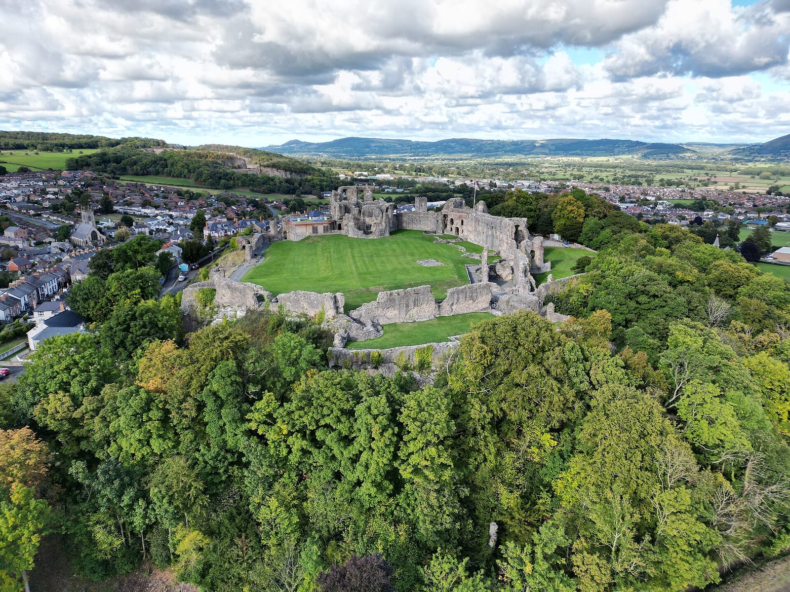 The hilltop ruins of Denbigh Castle above the town