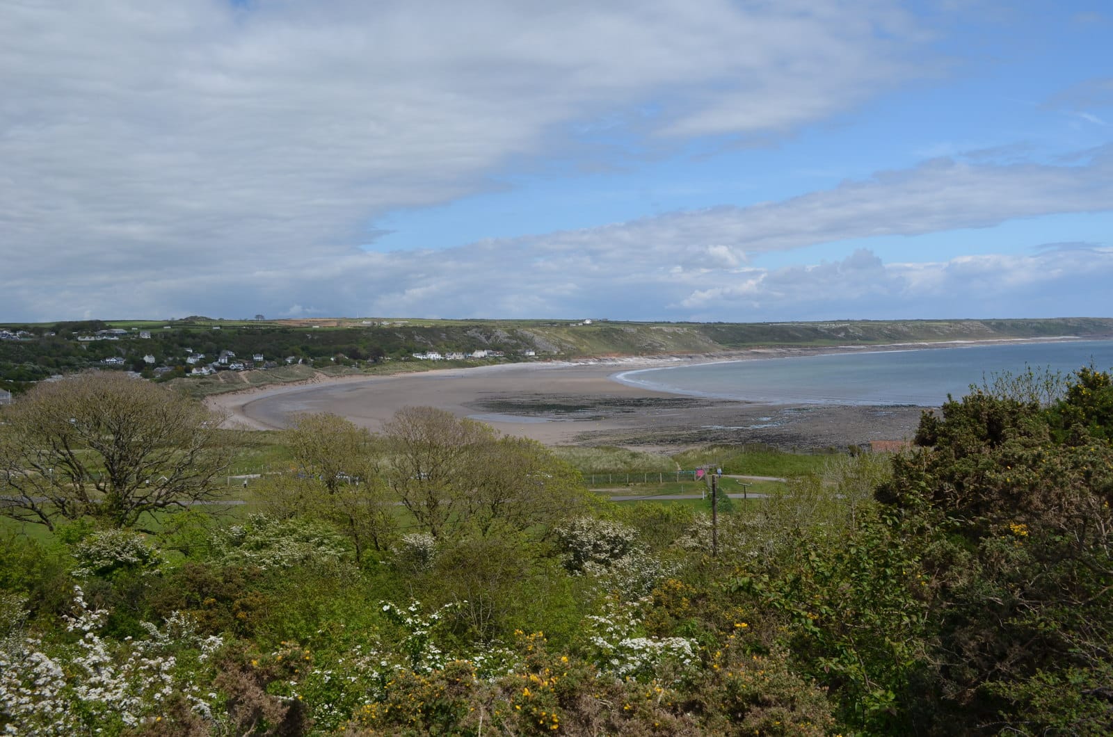 The sandy bay at Port Eynon on the south Gower coast